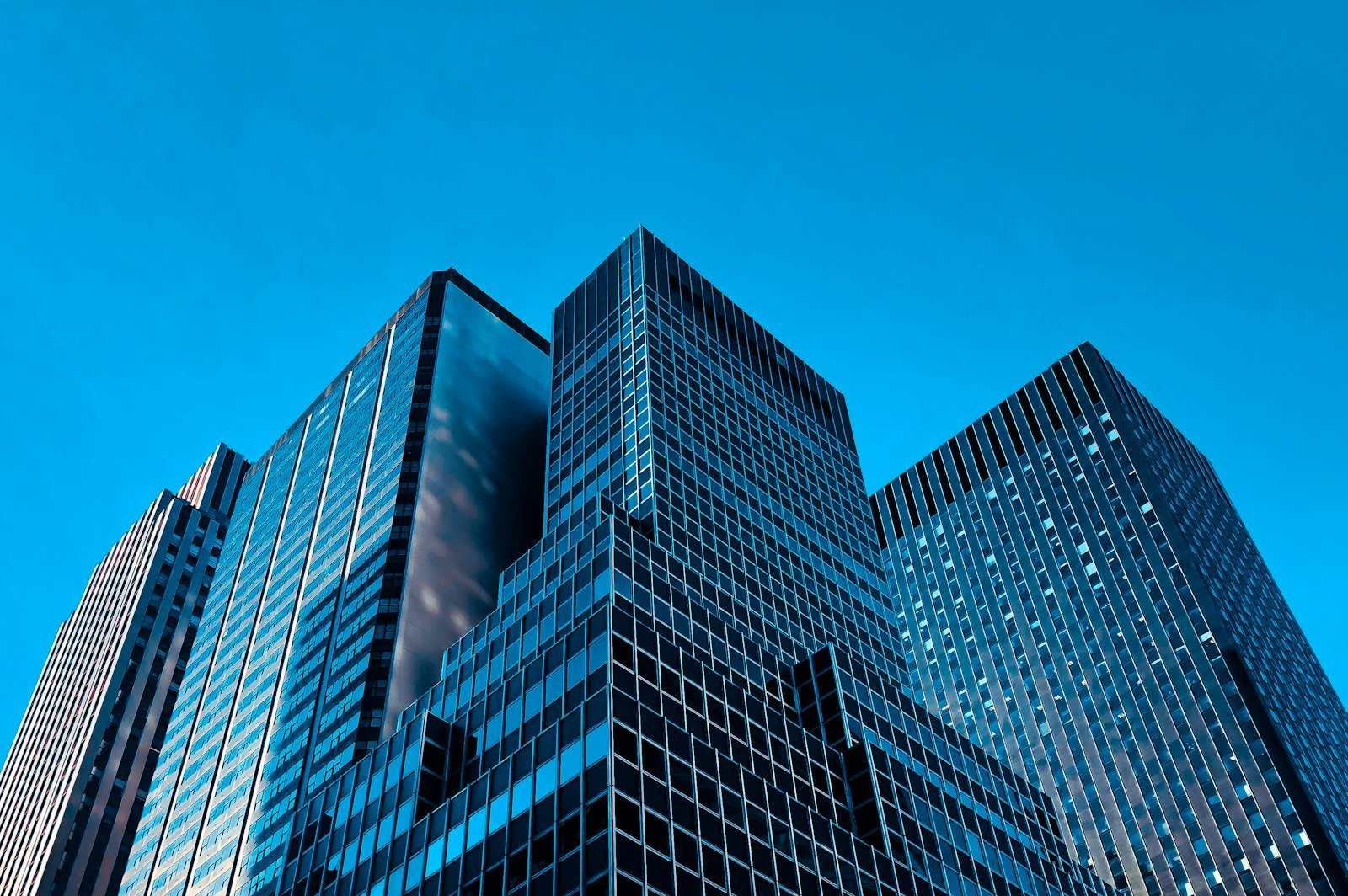 Low-angle view of glass high-rise buildings